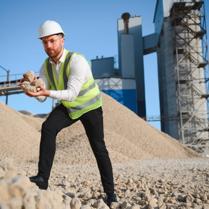 Engineer at the Crushed stone production plant. Gravel.